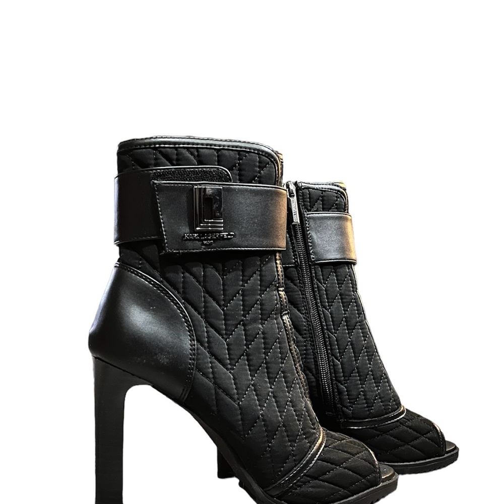 Open toe, inside zipper stilleto heel.